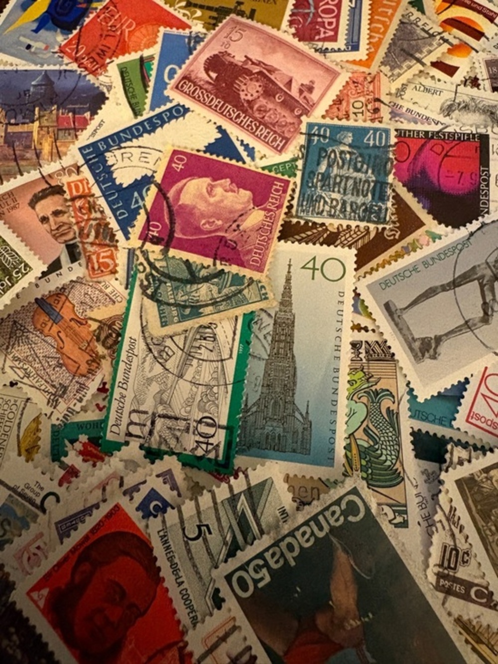 130 assorted German/ Deutsche Bundespost and Canada postage stamps- Lot #10